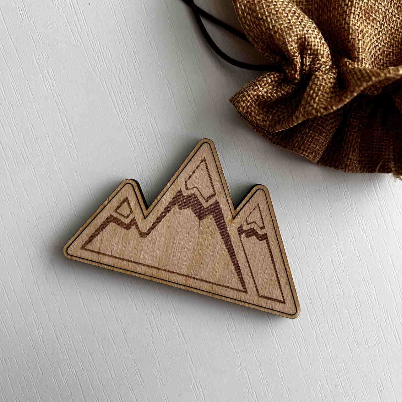 Kühlschrankmagnet in Bergform