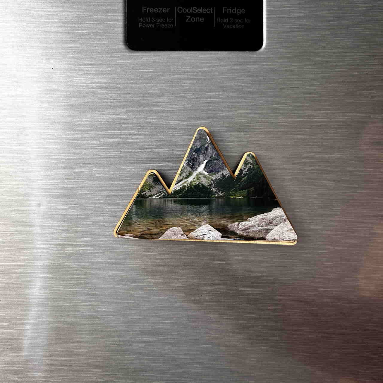 Kühlschrankmagnet in Bergform